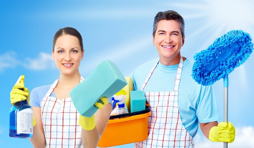 Technician wearing PPE during carpet cleaning in Barnet